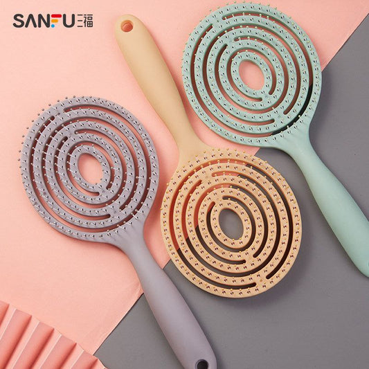 فرشة فك التشابك – ناعمة وآمنة لشعر خالي من العقد!