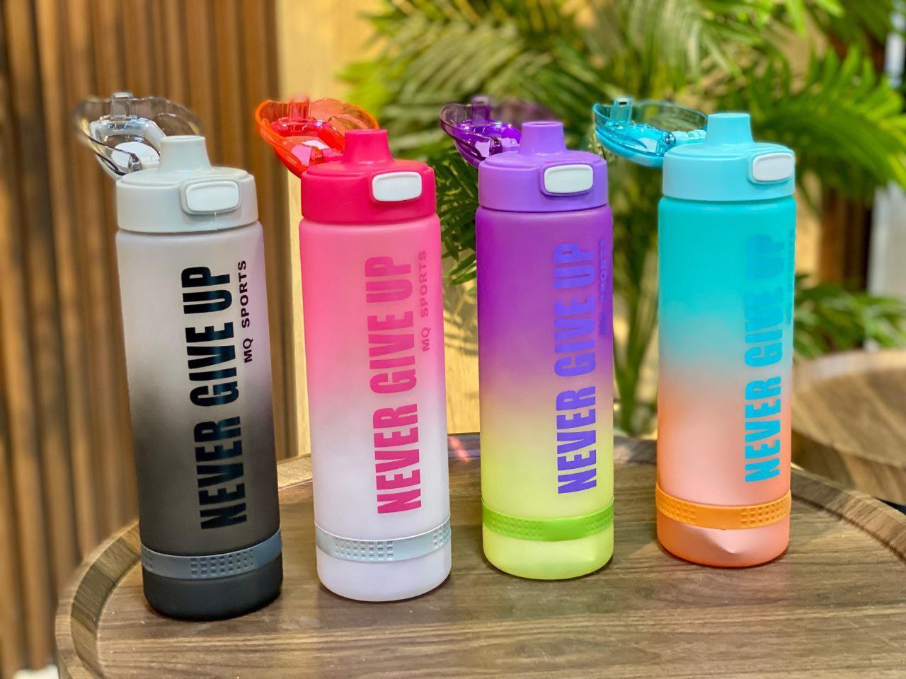 🥤 زجاجة مياه "Never Give Up" – سعة 1000 مل